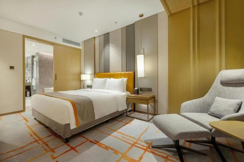 Bed in Hui Feng Wan Yun Hotel Hefei