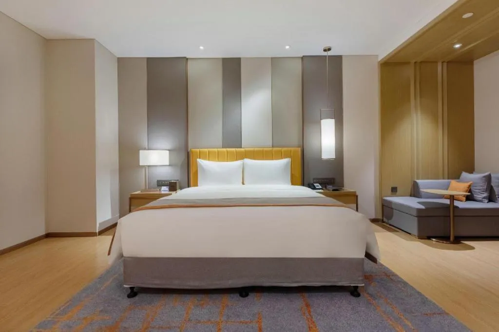 Bed in Hui Feng Wan Yun Hotel Hefei