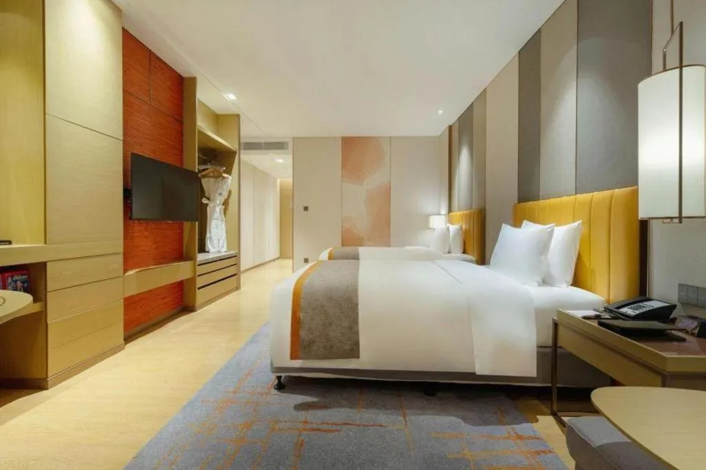 Bed in Hui Feng Wan Yun Hotel Hefei