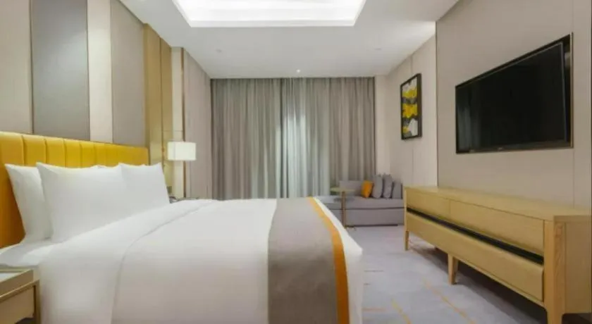 Bed in Hui Feng Wan Yun Hotel Hefei