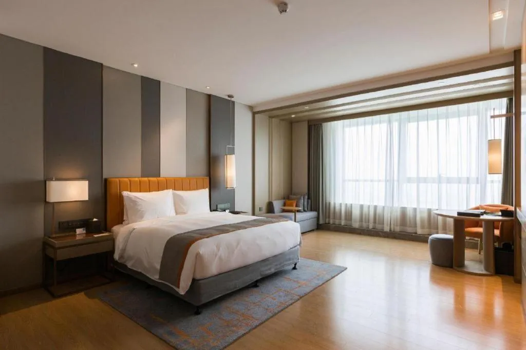 Bed in Hui Feng Wan Yun Hotel Hefei