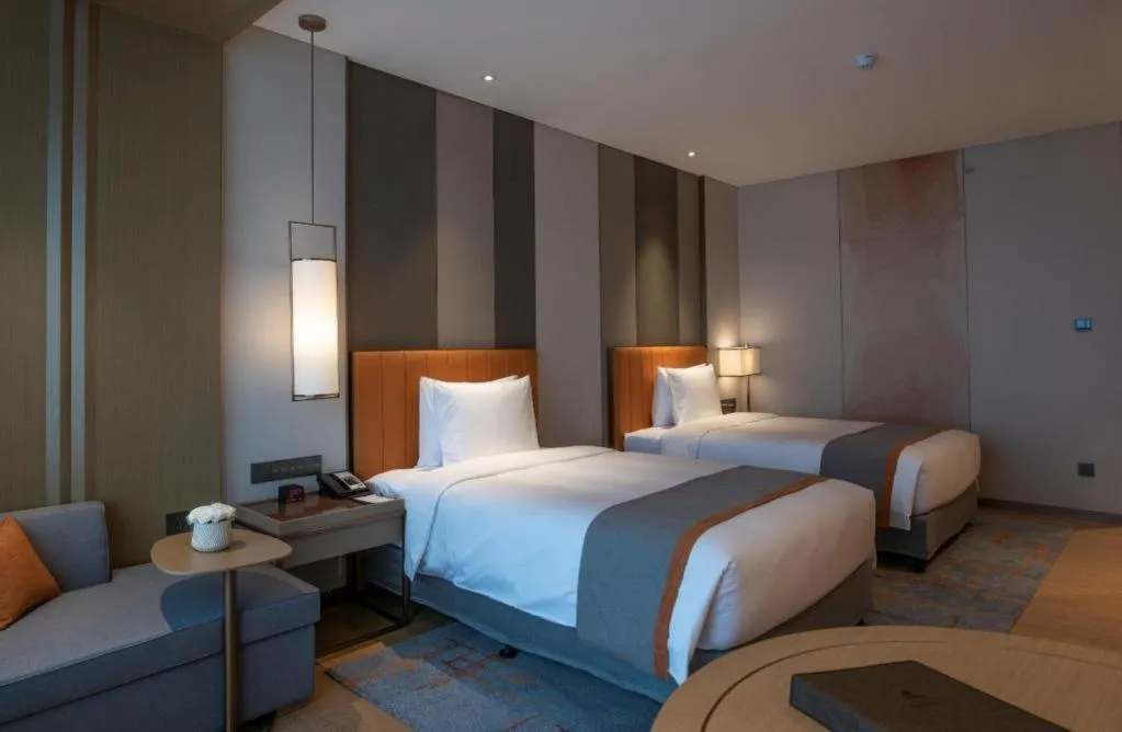 Bed in Hui Feng Wan Yun Hotel Hefei