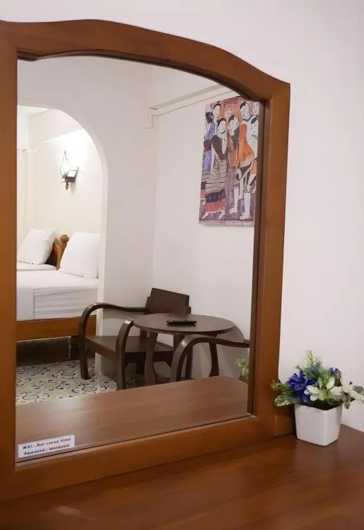 Bed in Nan Lanna Hotel