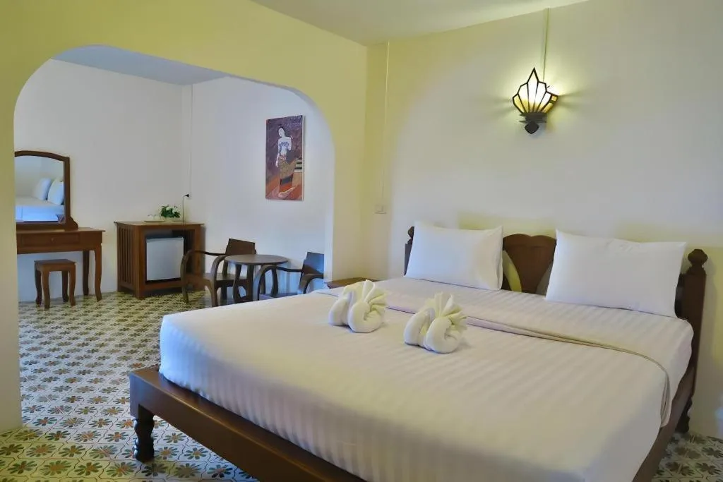 Bed in Nan Lanna Hotel