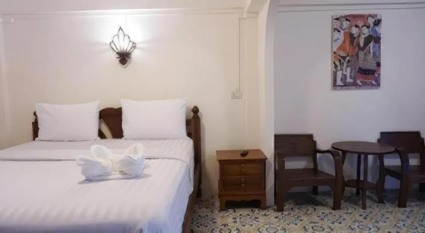 Bed in Nan Lanna Hotel