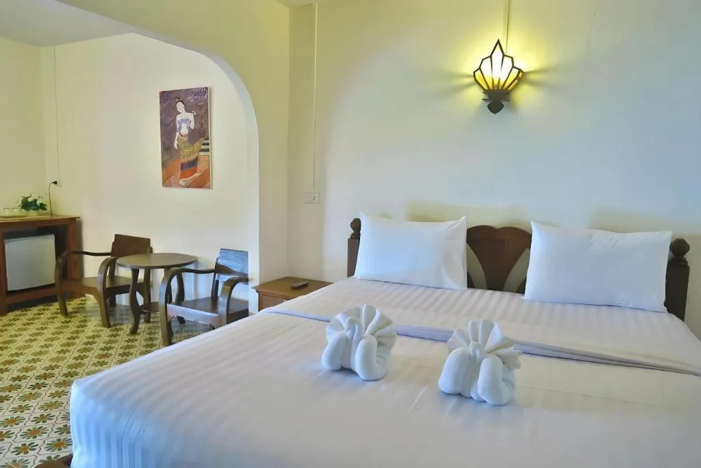 Bed in Nan Lanna Hotel