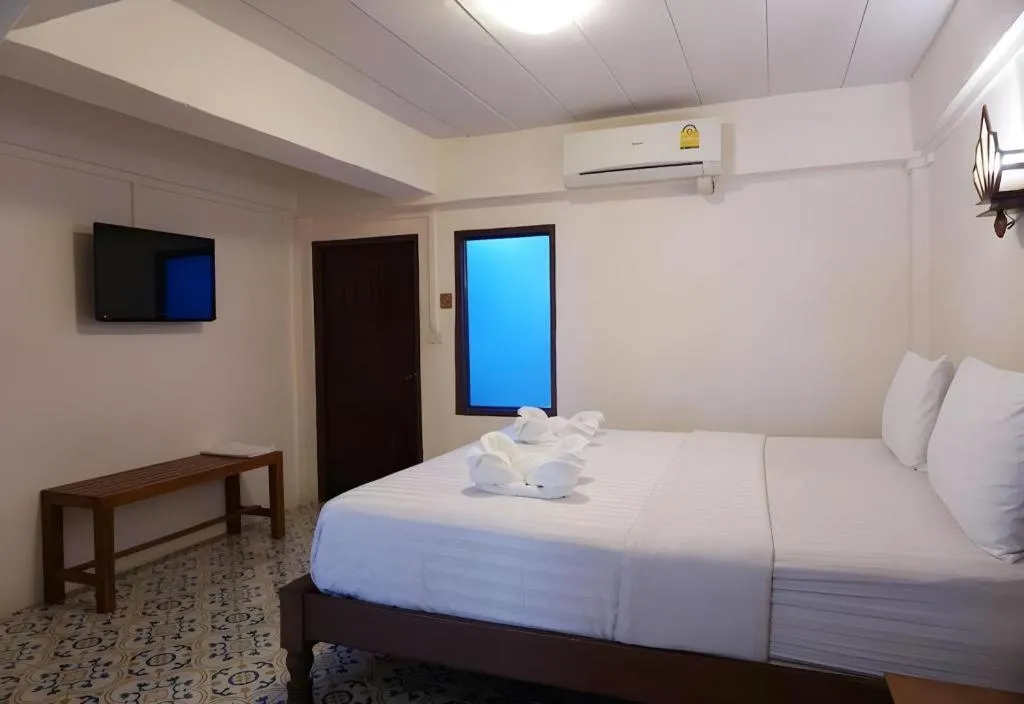 Bed in Nan Lanna Hotel