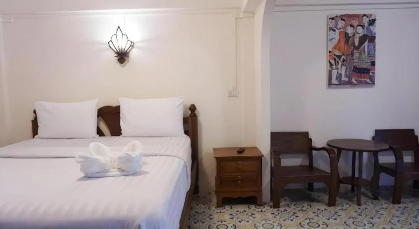 Bed in Nan Lanna Hotel