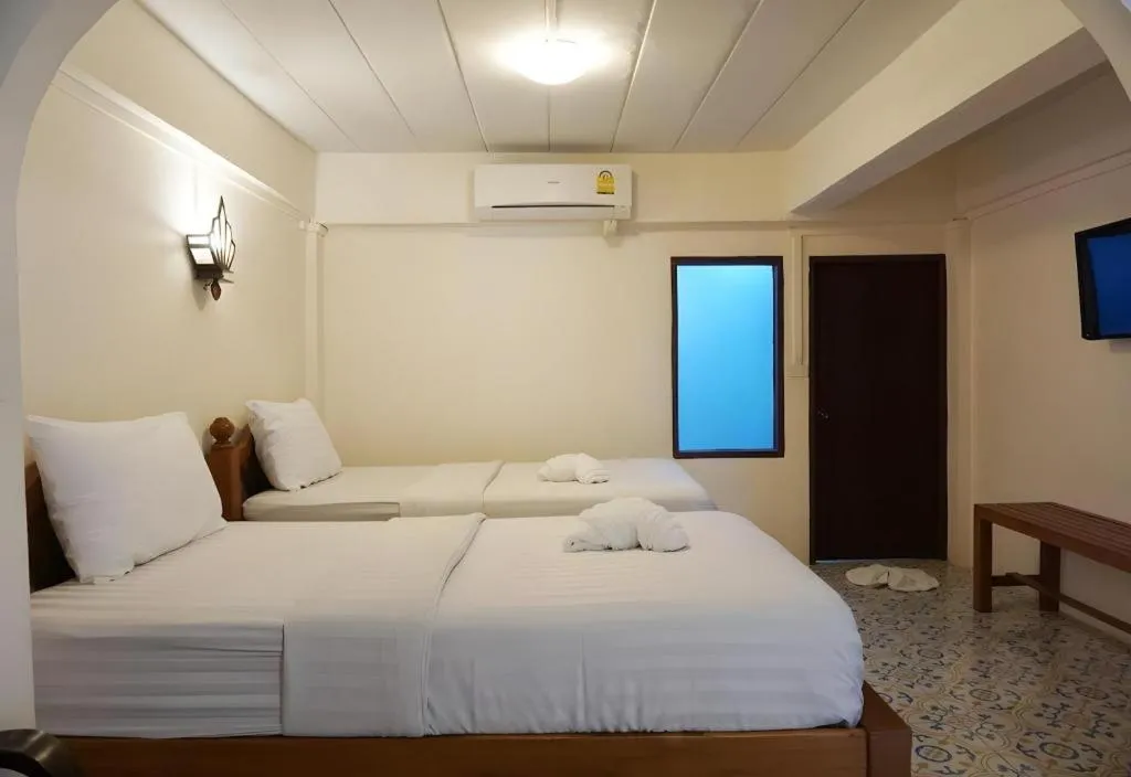 Bed in Nan Lanna Hotel