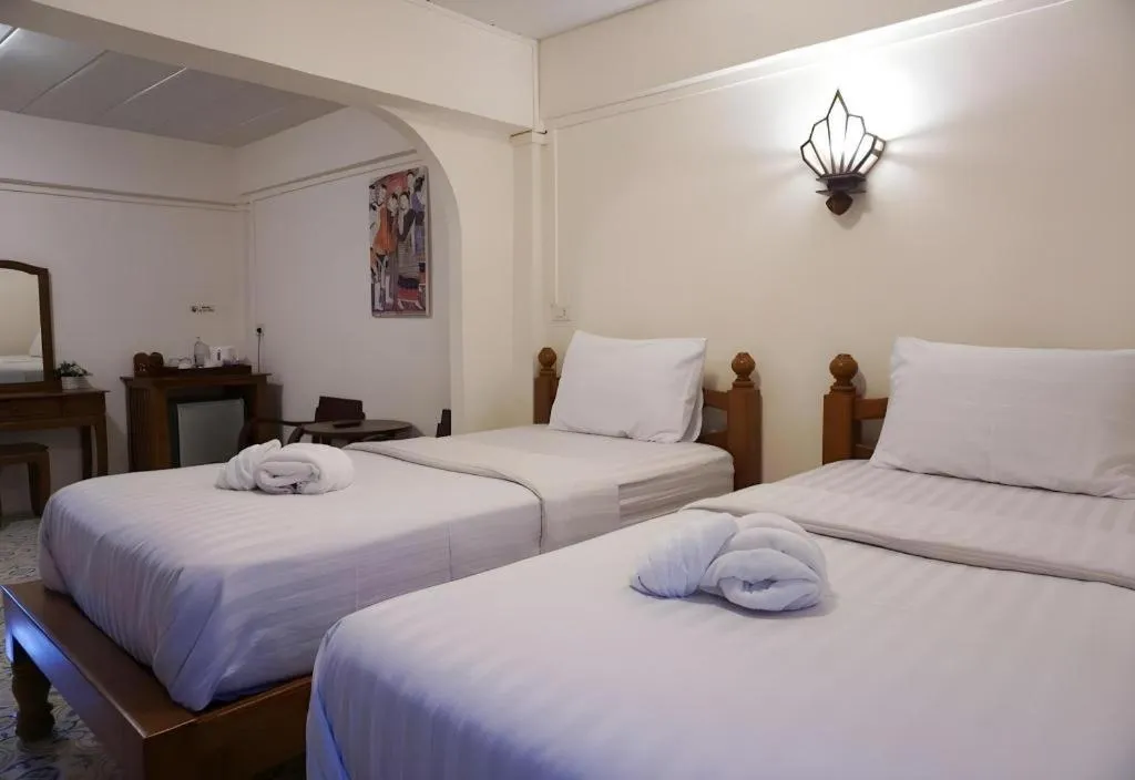 Bed in Nan Lanna Hotel