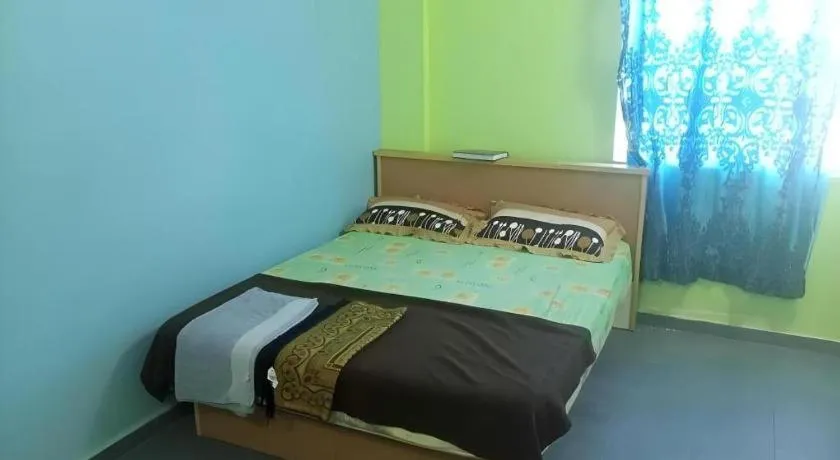 Bed in OYO 90471 Hotel Tepoh