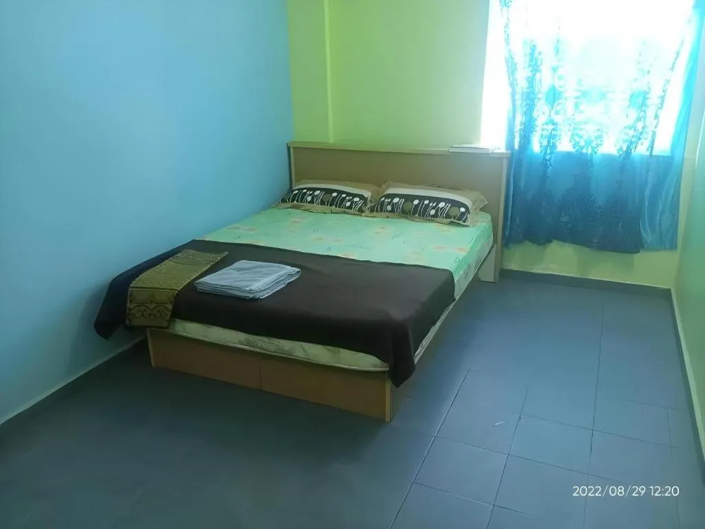 Bed in OYO 90471 Hotel Tepoh