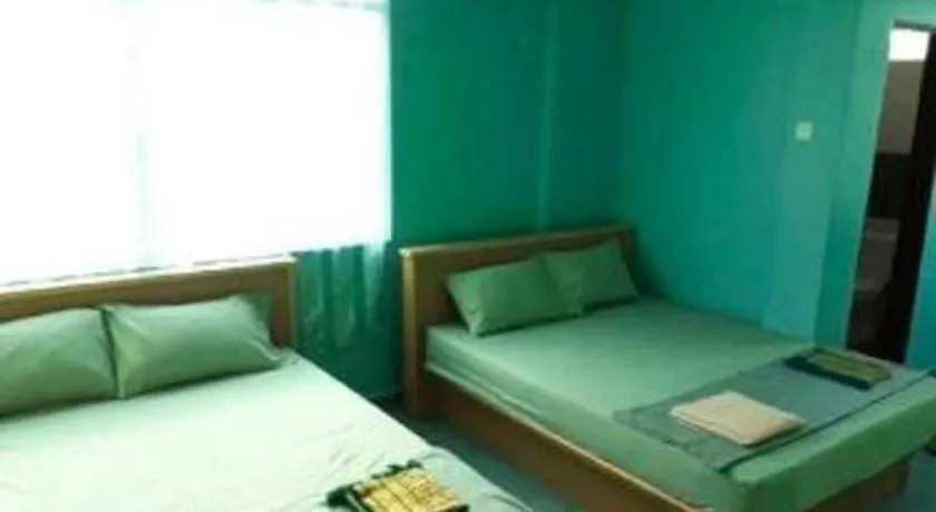 Bed in OYO 90471 Hotel Tepoh