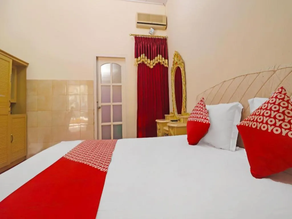 Bed in OYO 2899 Ardilia Bandara Syariah