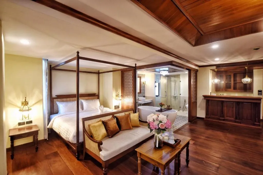 Bed in De Manor Chiang Mai Hotel