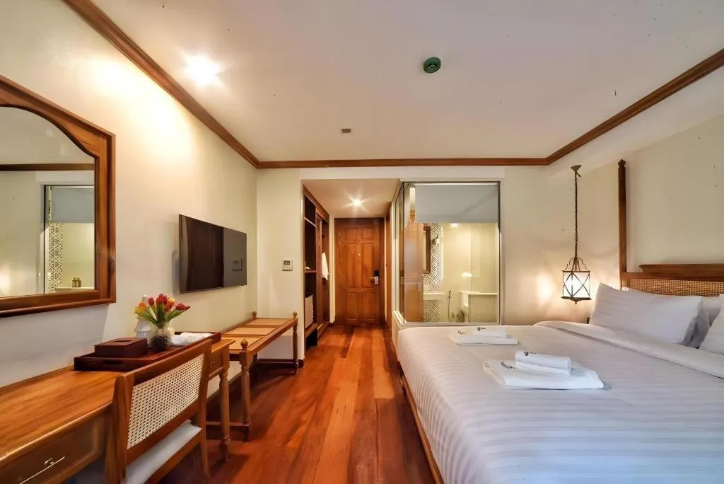 Bed in De Manor Chiang Mai Hotel