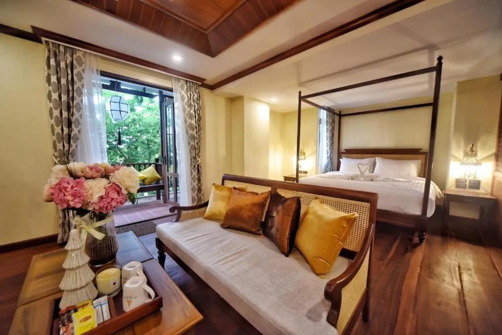 Bed in De Manor Chiang Mai Hotel