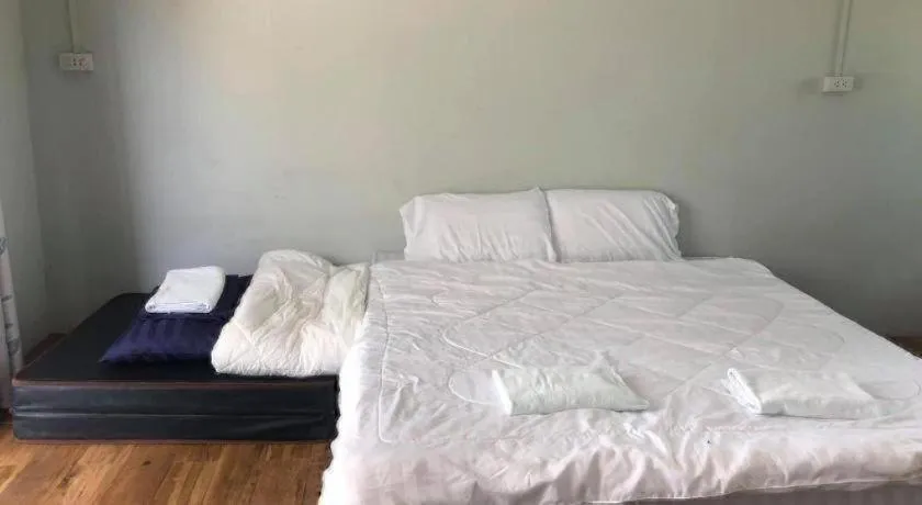 Bed in Capital O 75412 V Resort