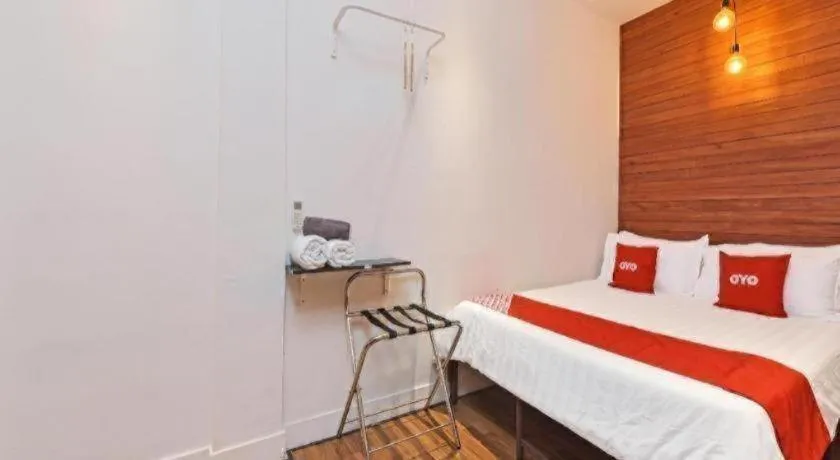 Bed in OYO 90662 The 1975 Hotel