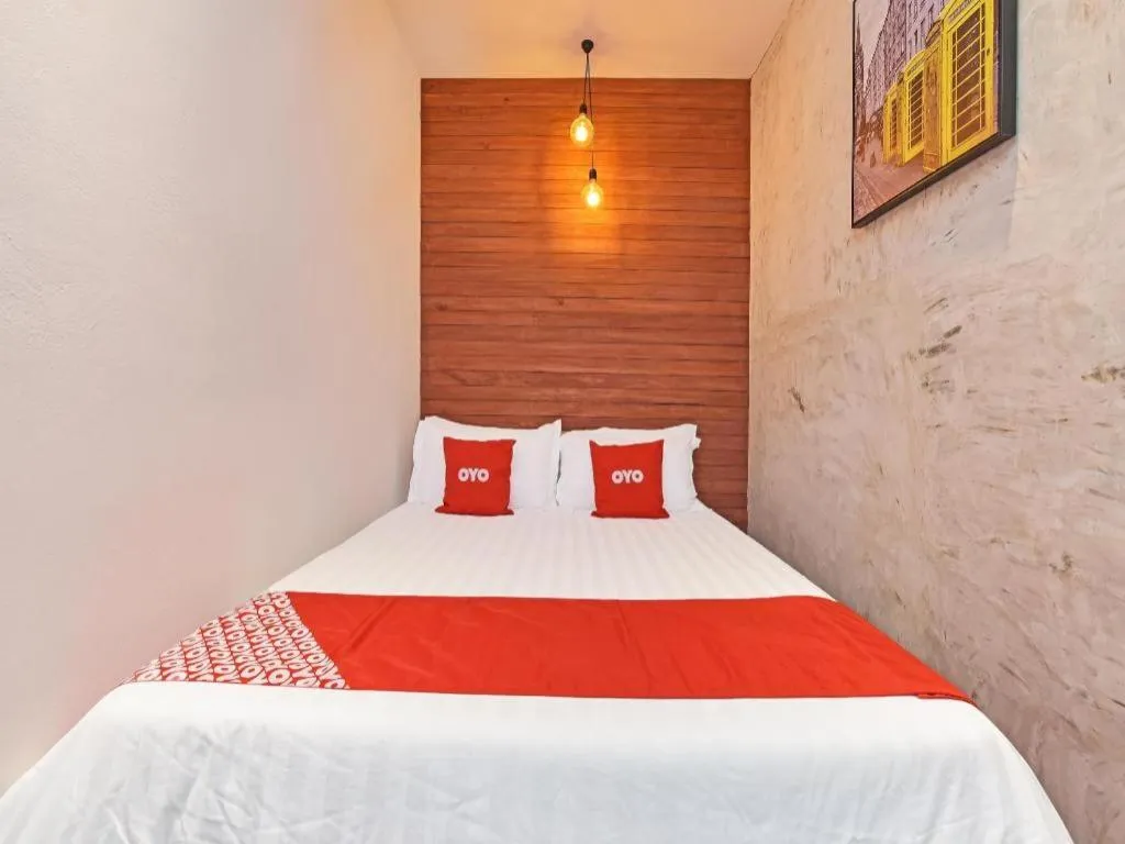 Bed in OYO 90662 The 1975 Hotel