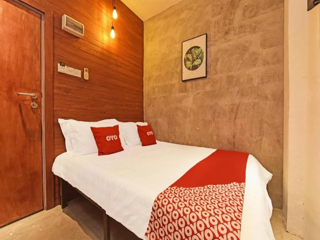 Bed in OYO 90662 The 1975 Hotel