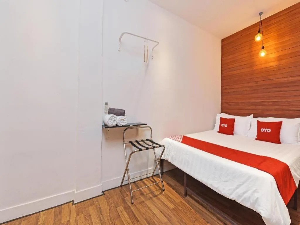 Bed in OYO 90662 The 1975 Hotel