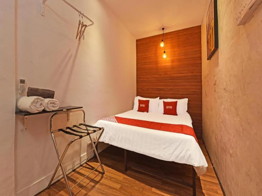 Bed in OYO 90662 The 1975 Hotel