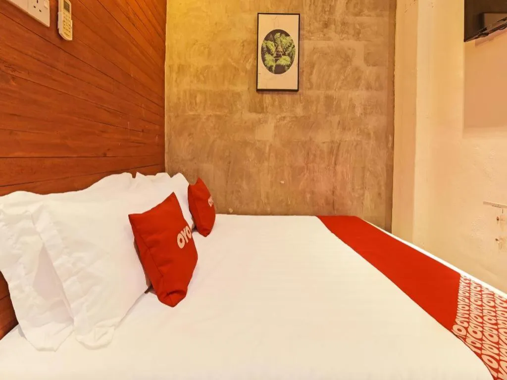 Bed in OYO 90662 The 1975 Hotel
