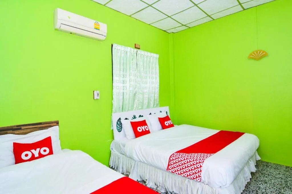 Bed in OYO 499 Pattaraporn Hotel