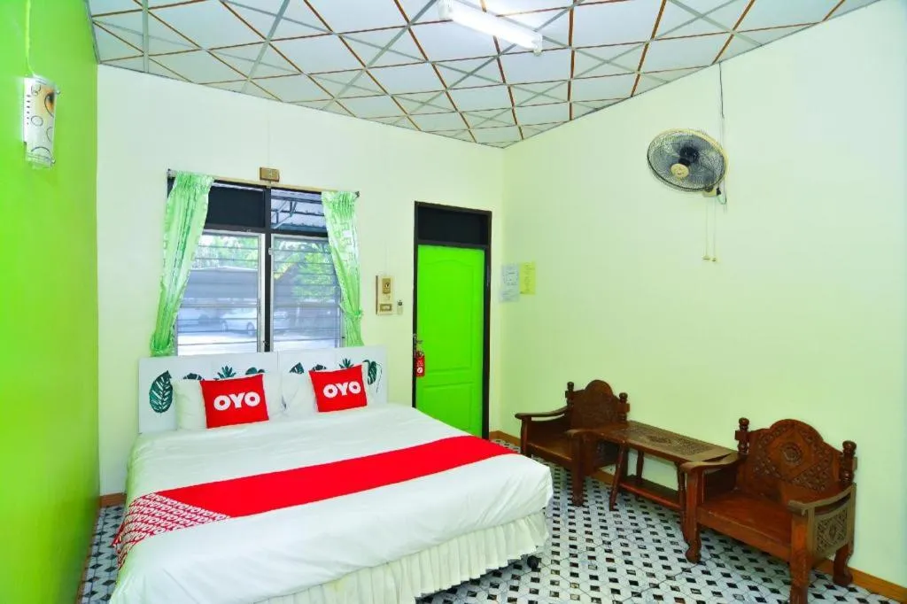 Bed in OYO 499 Pattaraporn Hotel