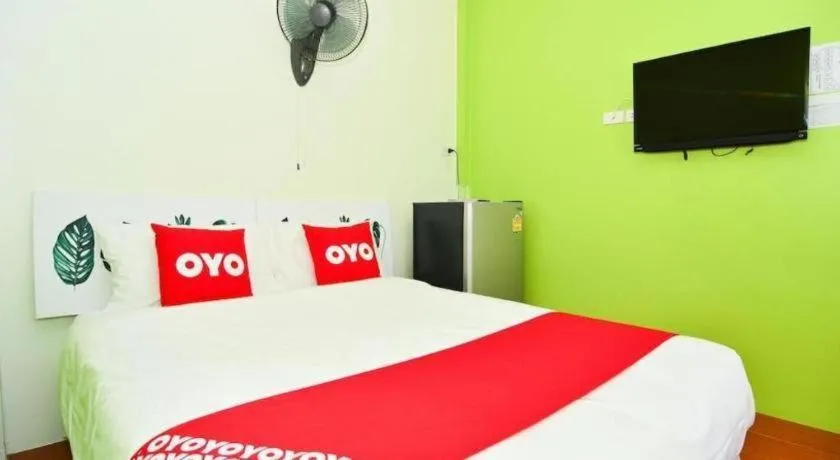 Bed in OYO 499 Pattaraporn Hotel