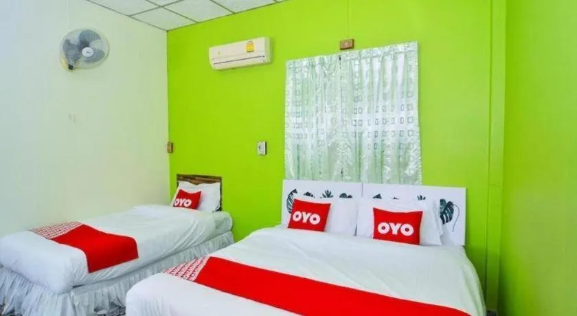 Bed in OYO 499 Pattaraporn Hotel