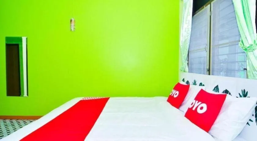 Bed in OYO 499 Pattaraporn Hotel