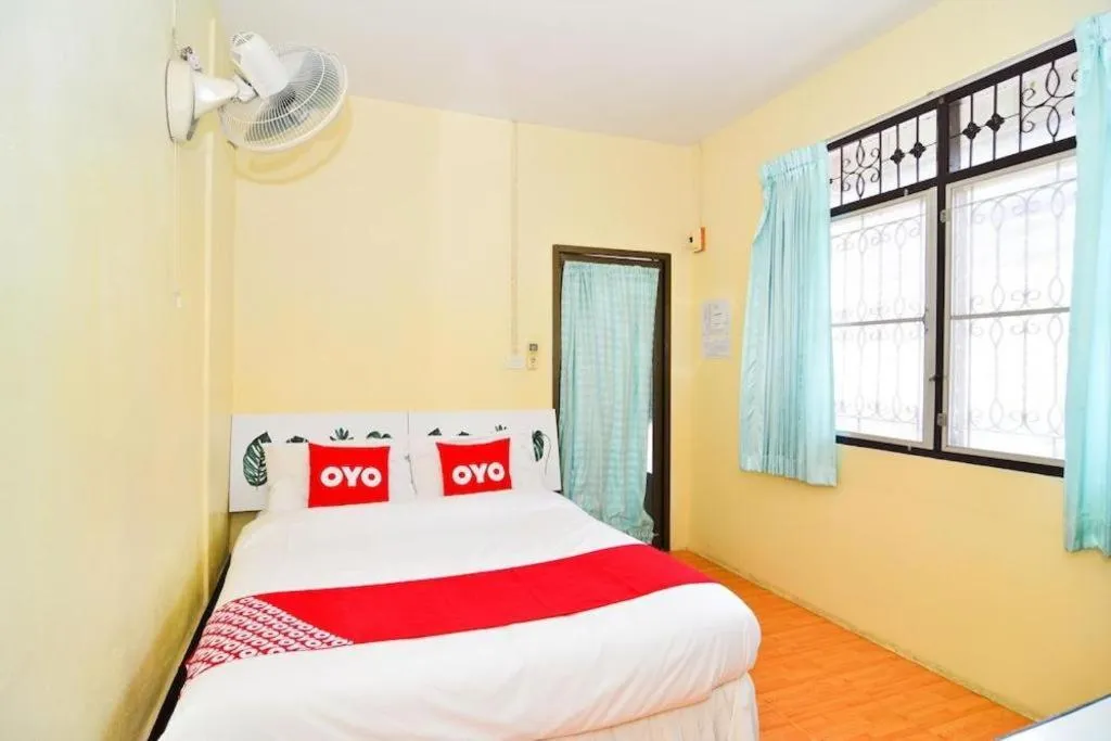 Bed in OYO 499 Pattaraporn Hotel