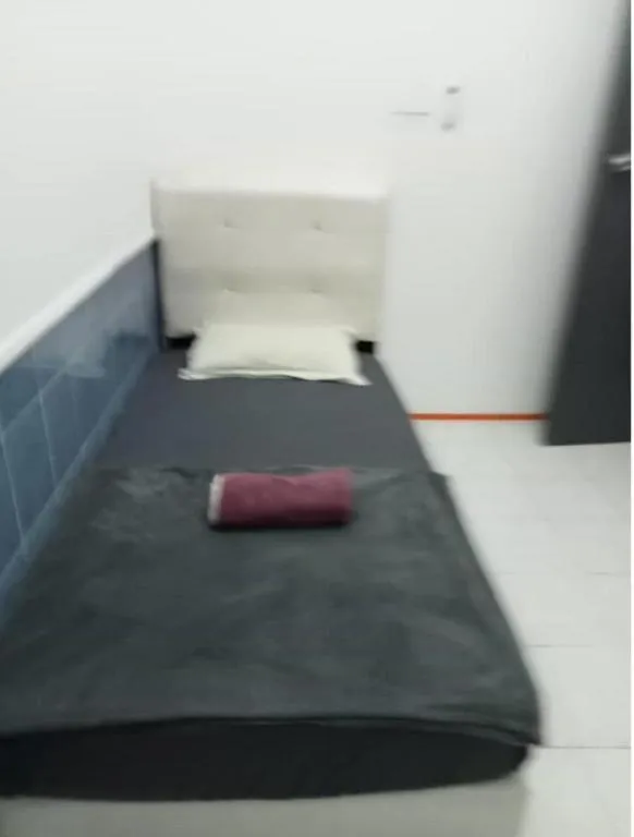 Bed in OYO HOME 90768 Flo Inn Motel