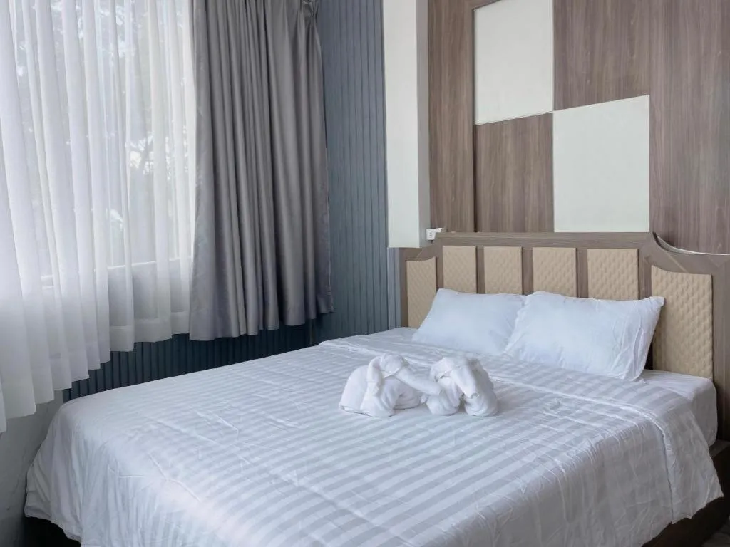 Bed in Heavenchy Hotel