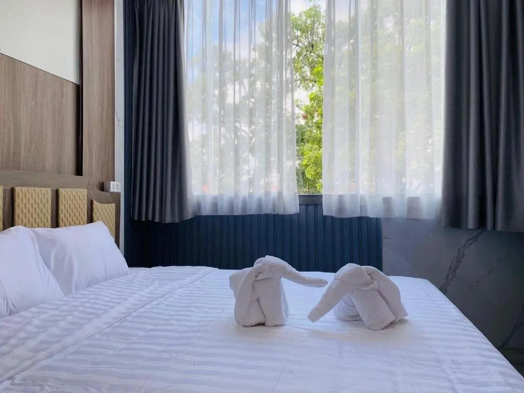 Bed in Heavenchy Hotel