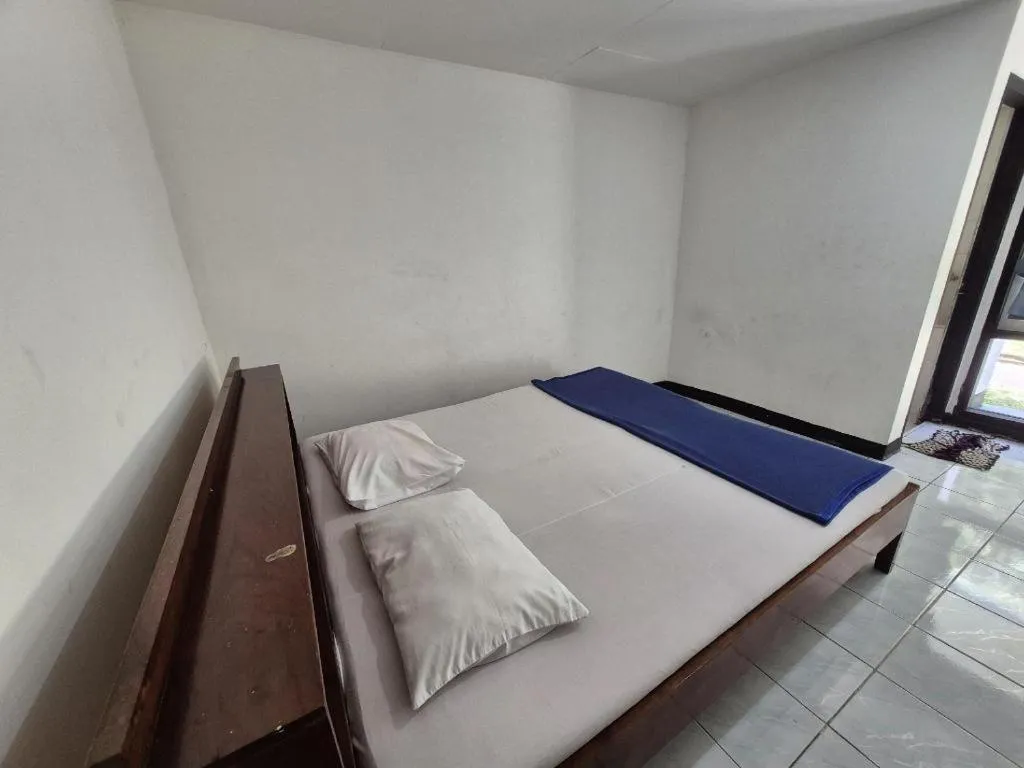 Bed in Capital O 94094 New Lembah Nyiur