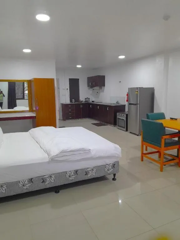 Bed in White Diamond Apartment