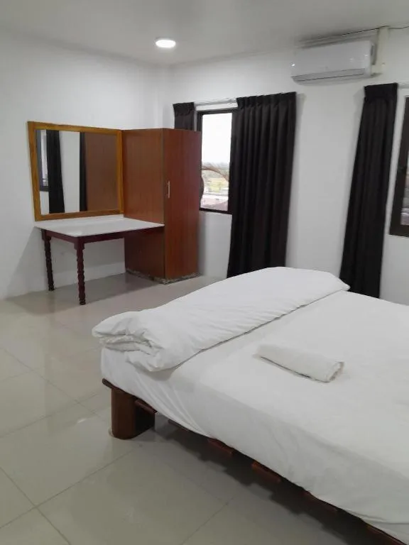 Bed in White Diamond Apartment