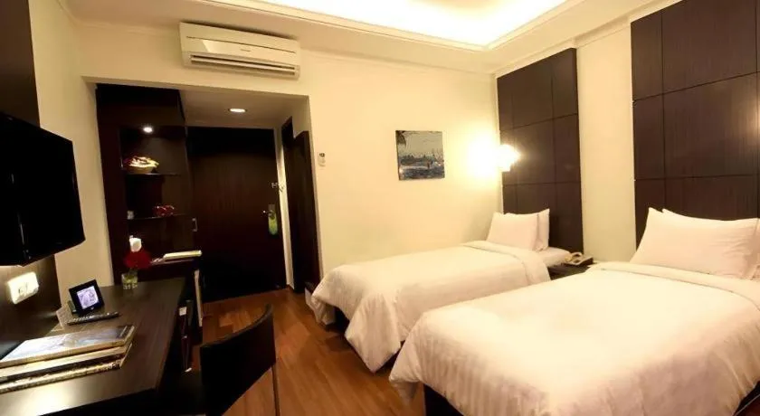 Bed in Bentani Hotel & Residence