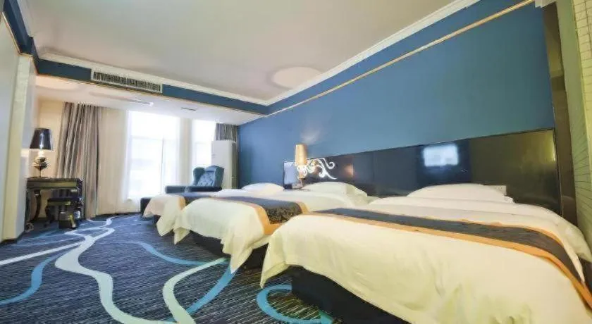 Bed in Guilin Sapphire hotel