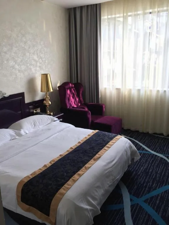 Bed in Guilin Sapphire hotel