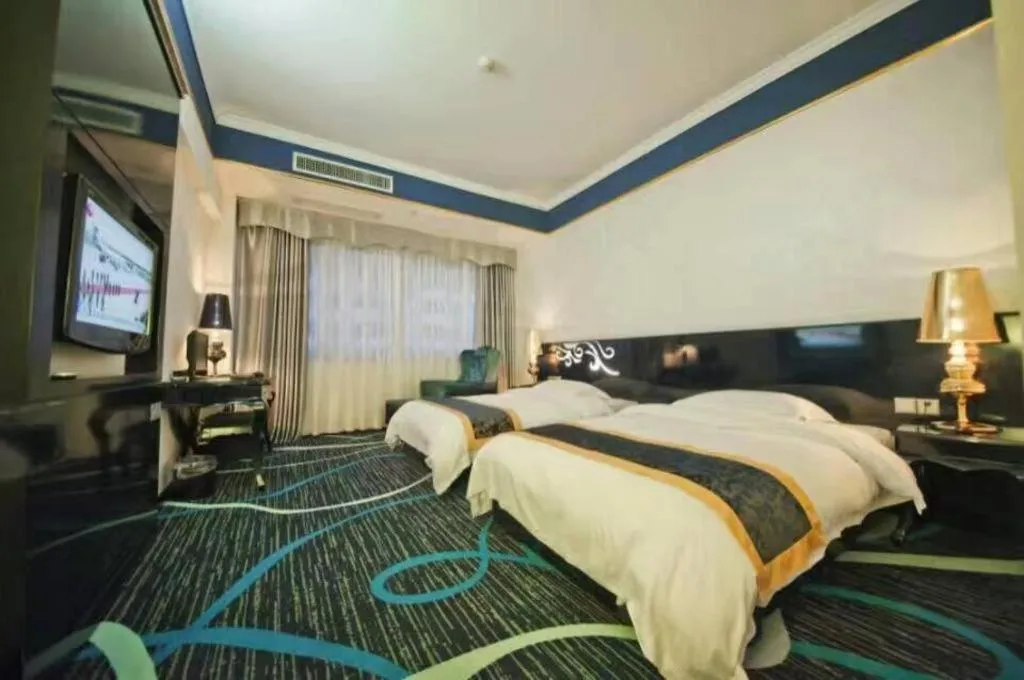Bed in Guilin Sapphire hotel
