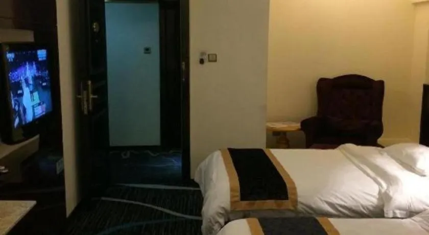 Bed in Guilin Sapphire hotel