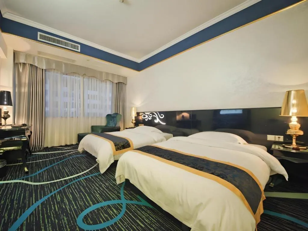 Bed in Guilin Sapphire hotel