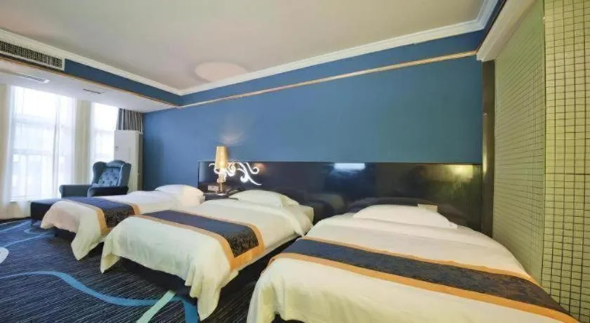 Bed in Guilin Sapphire hotel