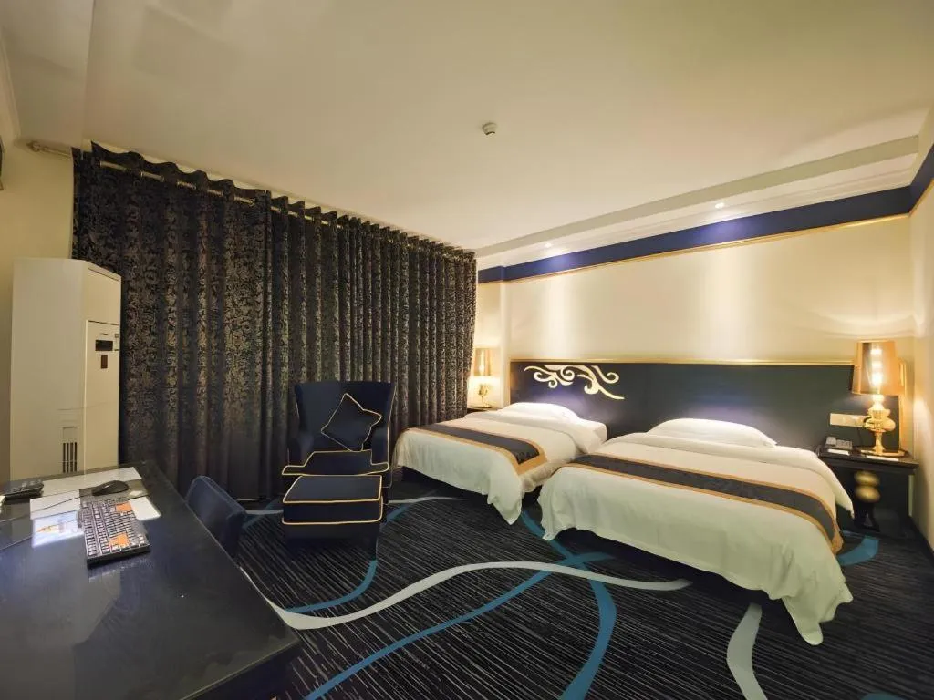 Bed in Guilin Sapphire hotel