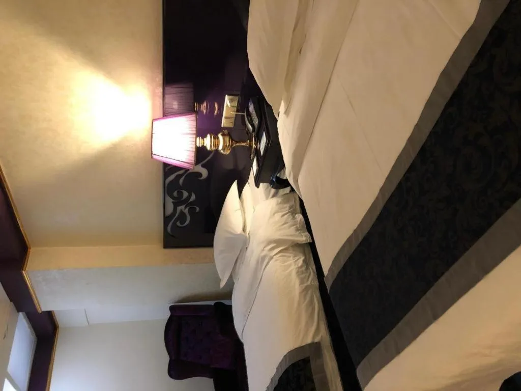 Bed in Guilin Sapphire hotel