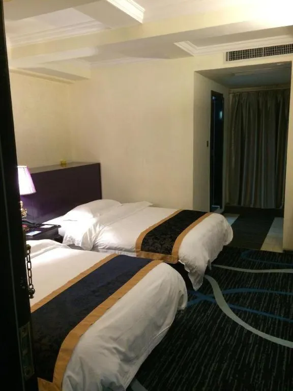 Bed in Guilin Sapphire hotel